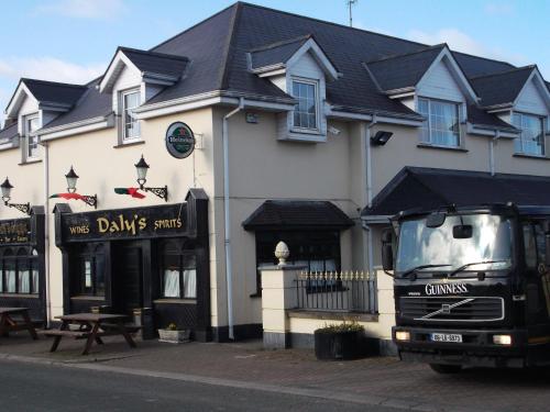 a truck parked in front of a building at Dalys Inn in Donore