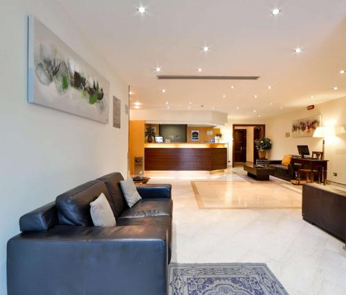 Posezení v ubytování Suites & Residence Hotel