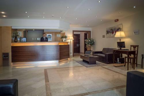 Posezení v ubytování Suites & Residence Hotel