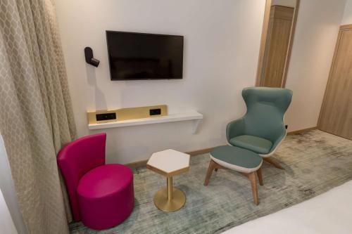 Μια τηλεόραση ή/και κέντρο ψυχαγωγίας στο Best Western Plus Comedie Saint Roch
