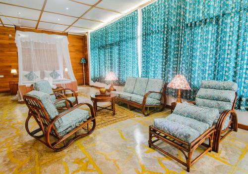 Ruang duduk di Thotupola Residence