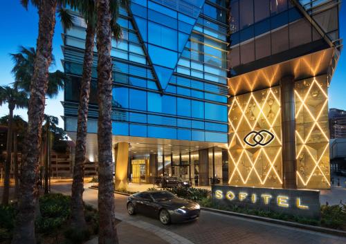 a car parked in front of a building at Sofitel Sydney Darling Harbour in Sydney
