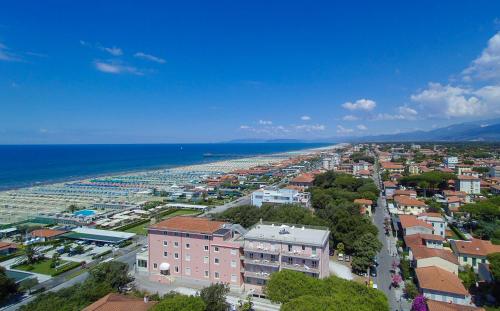 an aerial view of a city and the ocean at Hotel Happy in Marina di Pietrasanta