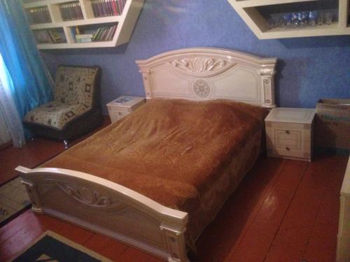 מיטה או מיטות בחדר ב-Gorgadze Apartment