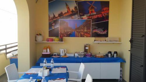 Un restaurant sau alt loc unde se poate mânca la Capital Bed Porto Cesareo