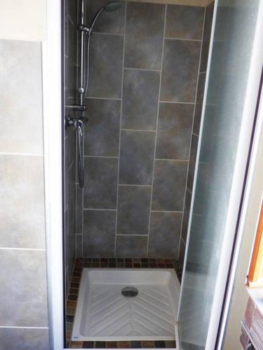 a shower stall with a toilet in a bathroom at Maison Authentique Proche Isola 2000 et Auron in Isola