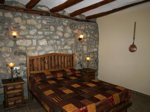 A bed or beds in a room at Apartamentos turísticos La Fuensanta