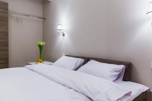 Кровать или кровати в номере Smart apartment проспект Гагарина