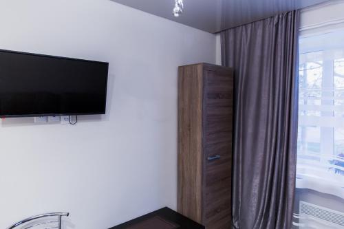 Телевизор и/или развлекательный центр в Smart apartment проспект Гагарина