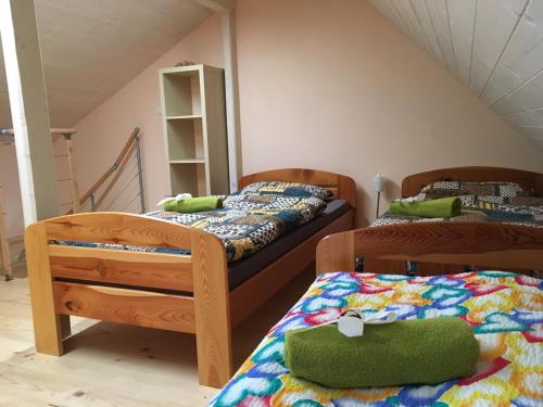 Postel nebo postele na pokoji v ubytování Penzion Kunvald Končiny