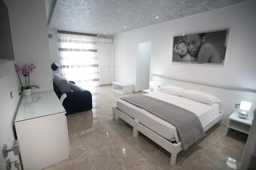 Кровать или кровати в номере Tropea Luxury & Charm
