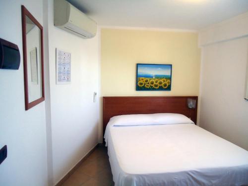 Postel nebo postele na pokoji v ubytování Hotel Ristorante Colleverde