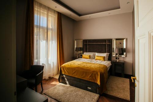 Posteľ alebo postele v izbe v ubytovaní Premium Apartments Villa Herkules
