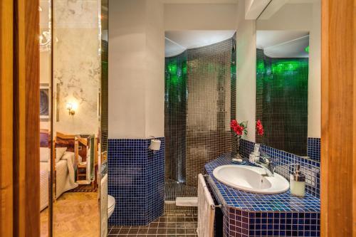 Kúpeľňa v ubytovaní Relais Conte Di Cavour De Luxe