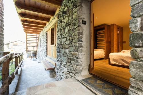 Posteľ alebo postele v izbe v ubytovaní Le Petit Coeur Residence De Montagne