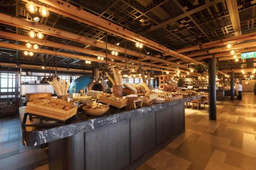a store with a counter with baskets on it at Novotel Istanbul Bosphorus Hotel in Istanbul