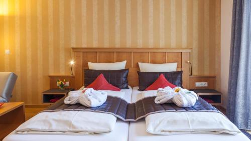 Katil atau katil-katil dalam bilik di Boutiquehotel zur Winzerstube - Adults Only