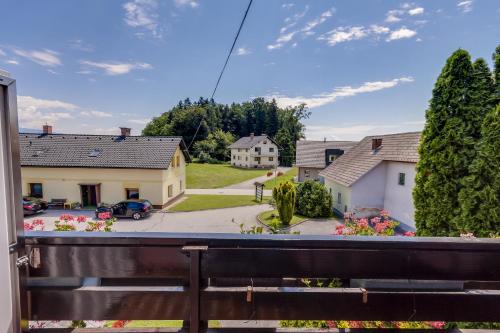 a view from the balcony of a house at Rooms & Apartments Jana in Cerklje na Gorenjskem