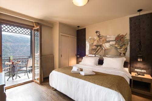 Postel nebo postele na pokoji v ubytování Kentrikon Hotel