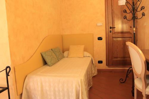 Postel nebo postele na pokoji v ubytování IL COLOMBAIO WINERY & Rooms