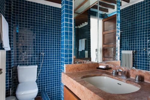 Kúpeľňa v ubytovaní Holodek Apartments : Kastella
