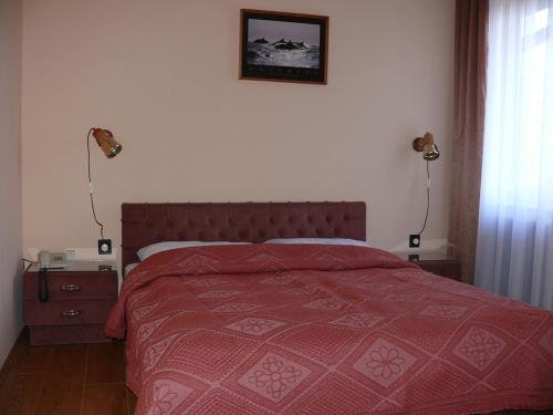 Voodi või voodid majutusasutuse Hotel Orchidea toas