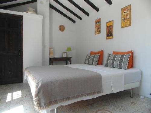 Säng eller sängar i ett rum på Casa el Chorro