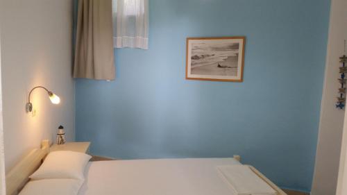 Una cama o camas en una habitación de Amparoudes