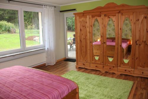 Postel nebo postele na pokoji v ubytování Ferienhaus "et Eifelparadiesje"