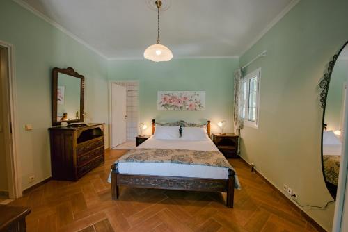 Ένα ή περισσότερα κρεβάτια σε δωμάτιο στο Villa Antia