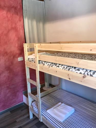 a couple of bunk beds in a room at casamariu in Lucca