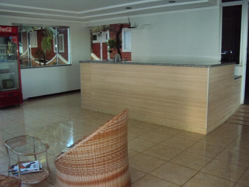 The lobby or reception area at Hotel Brasão