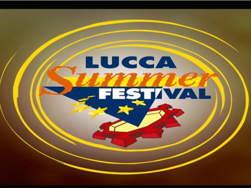 a sign for a summer festival with the luccca summer festival logo at casamariu in Lucca