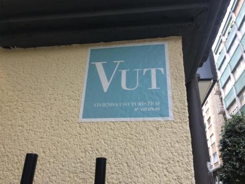 a sign on the side of a building at MenVal16 in Gijón
