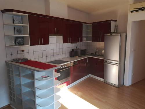 Kuchyň nebo kuchyňský kout v ubytování Centrum - A. Apartman