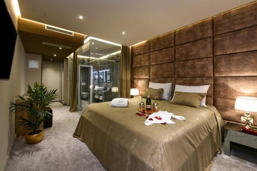 Ένα ή περισσότερα κρεβάτια σε δωμάτιο στο Luxury Rooms LaVie - Deluxe Rooms
