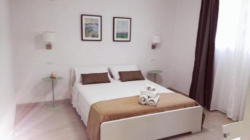 Postel nebo postele na pokoji v ubytování B&B rizziettu