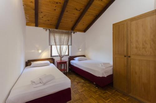Postel nebo postele na pokoji v ubytování Apartments Vesna with pool