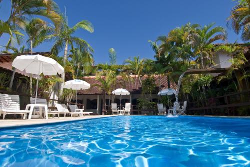 A piscina localizada em Apart Hotel Porto Kanoas ou nos arredores