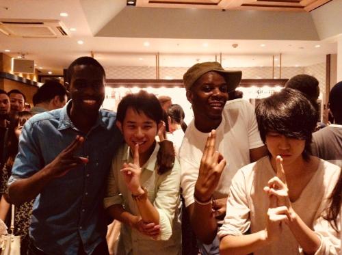 a group of people holding up their fingers at ONE HOSTEL Himeji ワンホステル姫路 in Himeji