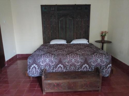 Katil atau katil-katil dalam bilik di Doeloerkoe Homestay