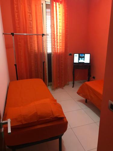 TV a/nebo společenská místnost v ubytování Casa Angela