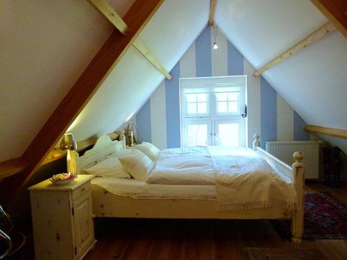 Кровать или кровати в номере 't Kasteeltje