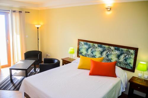 Ένα ή περισσότερα κρεβάτια σε δωμάτιο στο Emoyeni Gardens