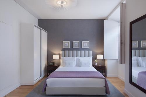 Katil atau katil-katil dalam bilik di Grape Harbor Prata Apartments