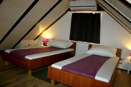 Posteľ alebo postele v izbe v ubytovaní Apartment Cukarin A2 BOL-CENTER, Croatia