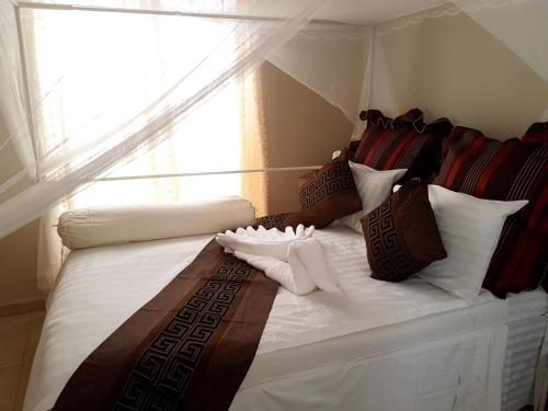 Postel nebo postele na pokoji v ubytování Purview Lodge