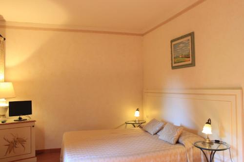 Postel nebo postele na pokoji v ubytování IL COLOMBAIO WINERY & Rooms
