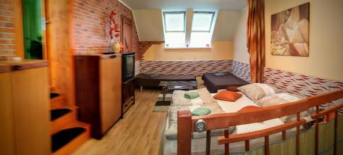A bed or beds in a room at Apartmán Slnečnica