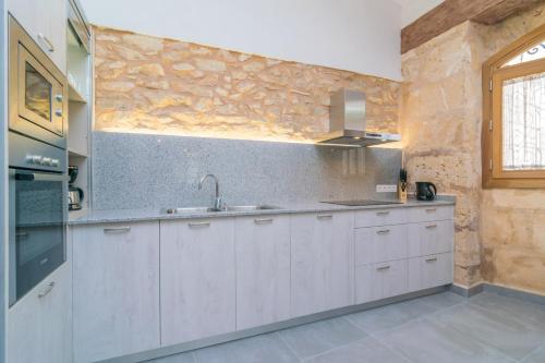 Η κουζίνα ή μικρή κουζίνα στο Can Tianet